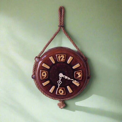 Vintage Ceramic wall Clock from the 70s - hanging on the wall - front